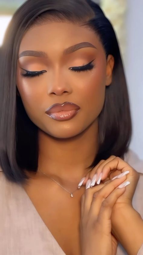 Sleek bob install with bronze glam eyes and a glossy brown lip