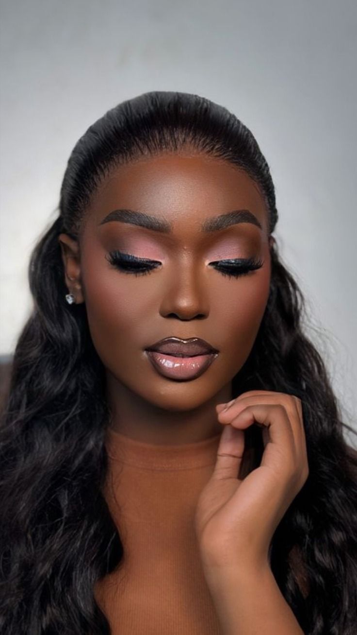 Long wavy install with a pink-eyed natural glam look